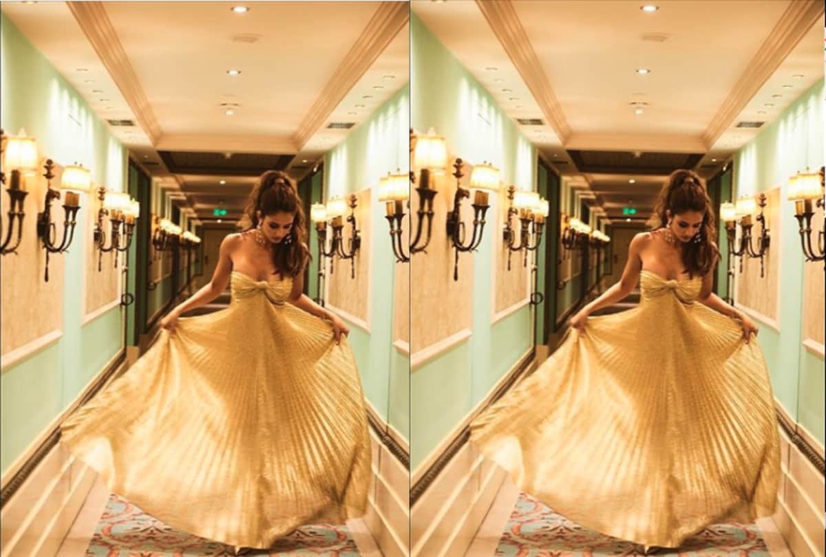 Disha Patani Looks Drop Dead Gorgeous in Golden Metallic Tube Gown