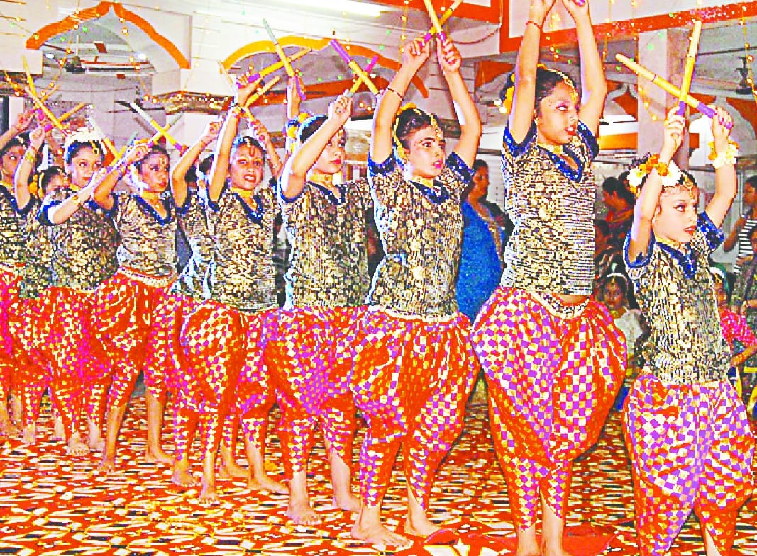 False devotees on dandiya dance