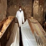thousands of years old Egyptian sarcophagus mummy in gold found in opened on live Discovery channel