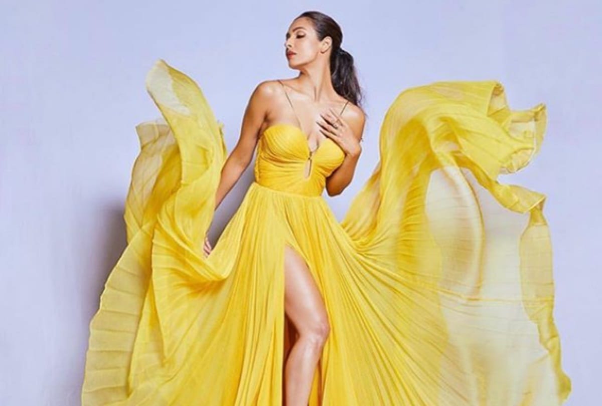 Malaika Arora look stunning in yellow thigh high slit sheer gown