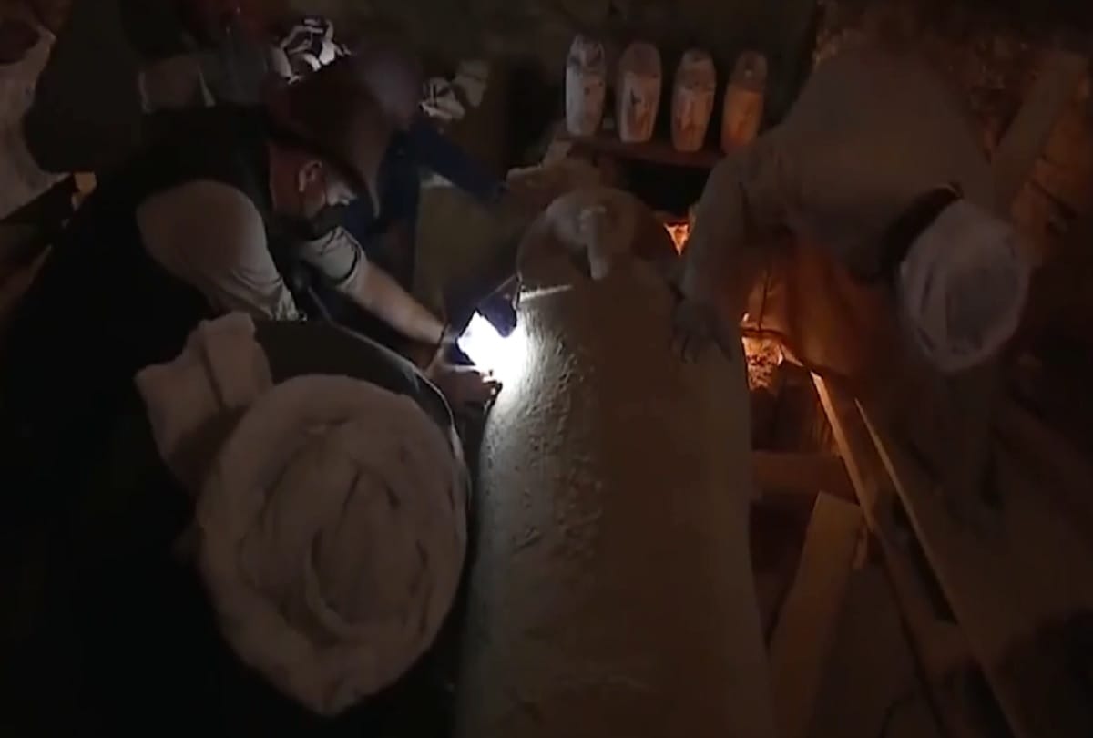 thousands of years old Egyptian sarcophagus mummy in gold found in opened on live Discovery channel