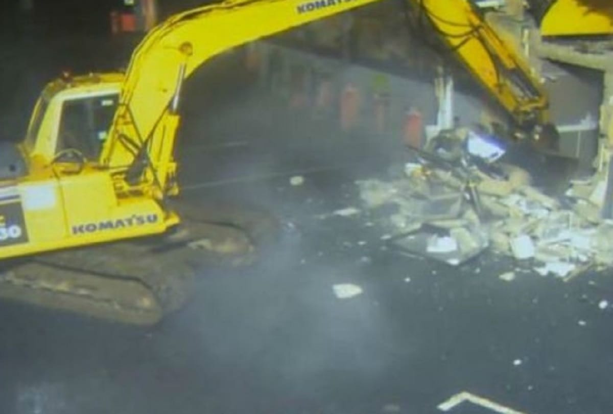 Thieves used Stolen crane to rip ATM from shop wall in Northern Ireland police releases video