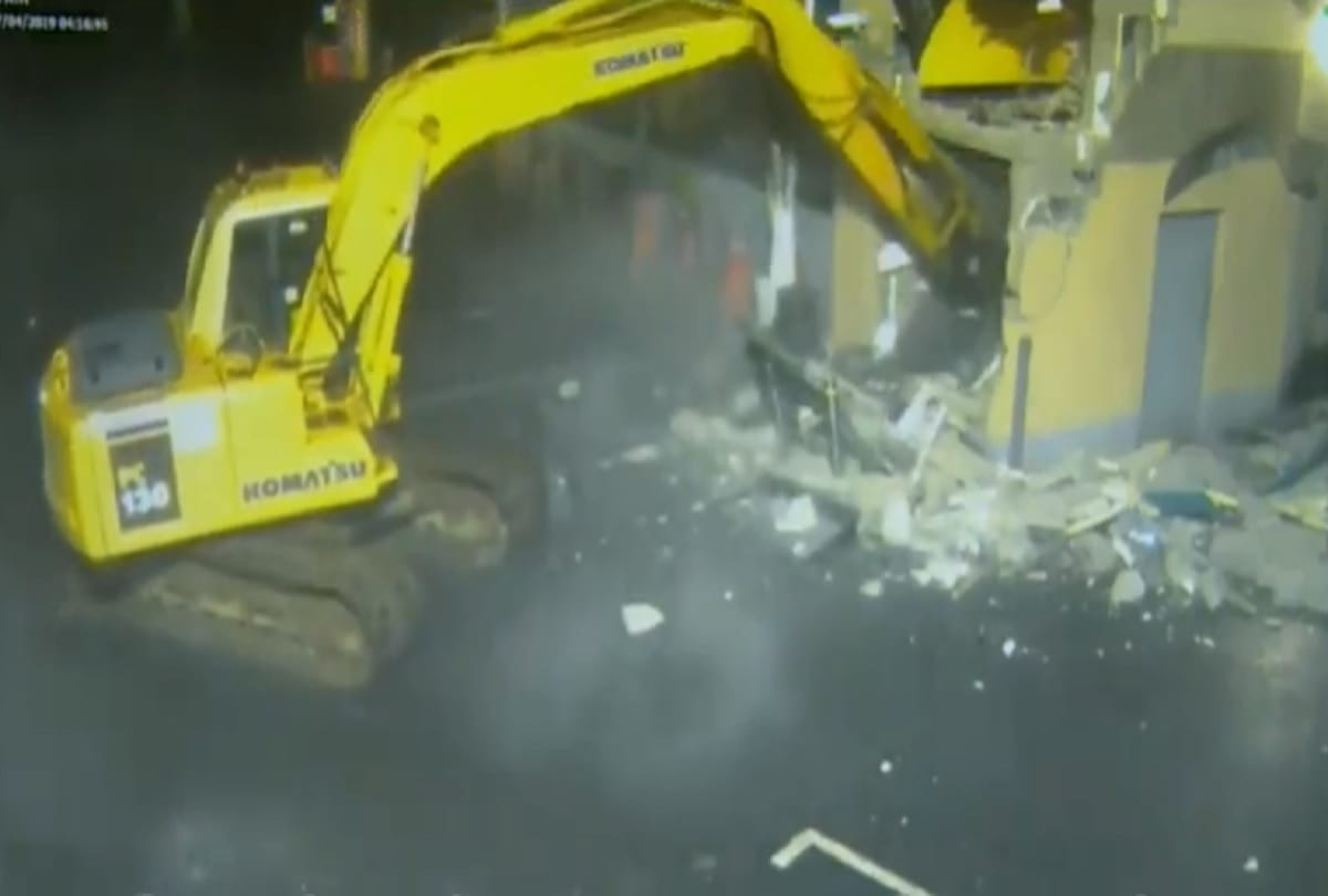 Thieves used Stolen crane to rip ATM from shop wall in Northern Ireland police releases video