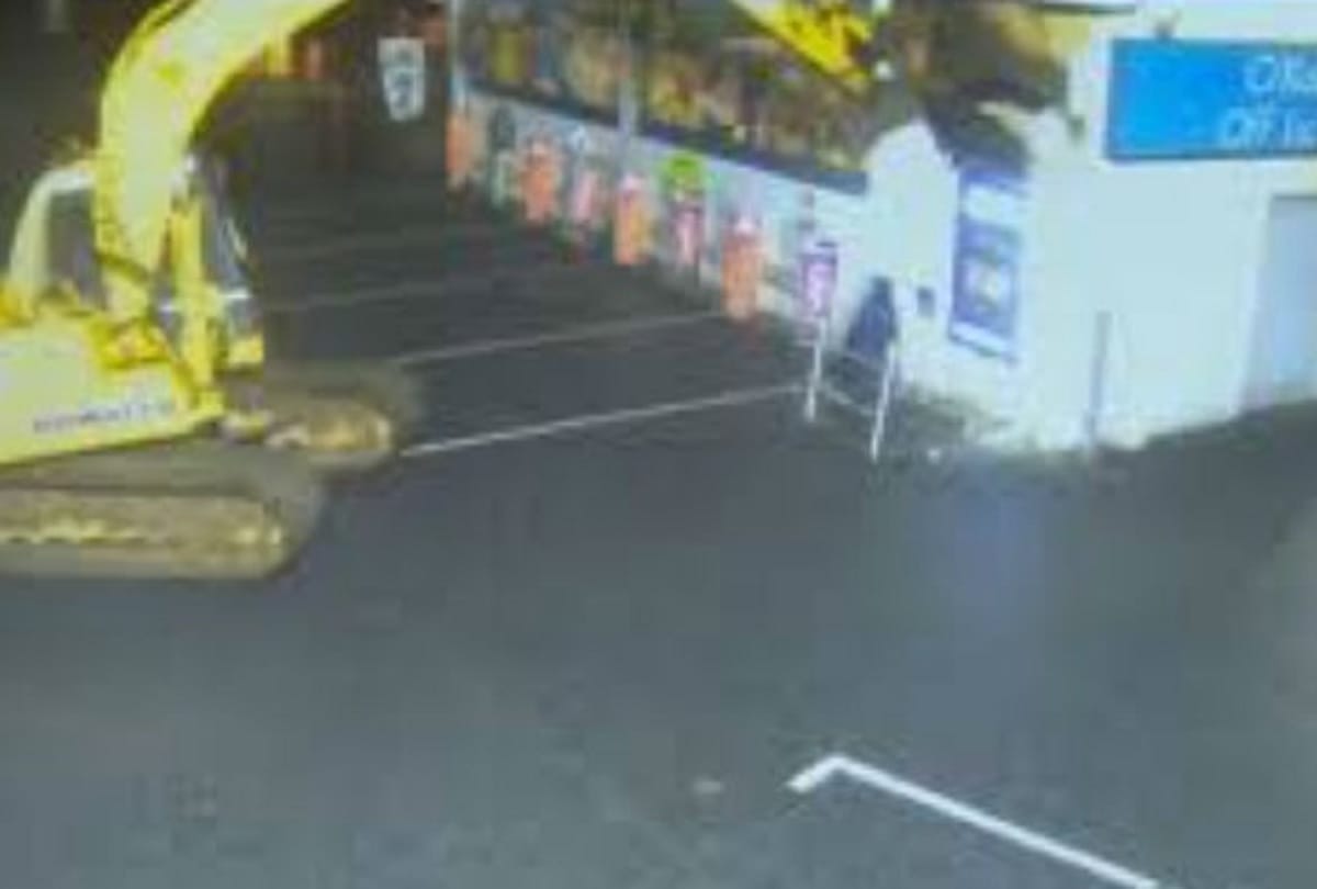 Thieves used Stolen crane to rip ATM from shop wall in Northern Ireland police releases video