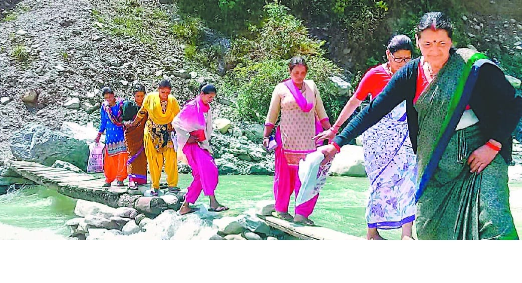 Polling centers crossing raw bridges built on Ramganga