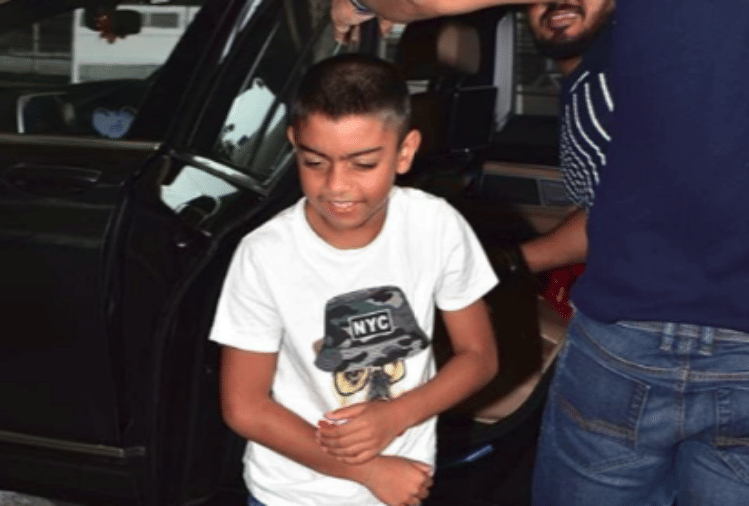 ajay devgn with son yug spot mumbai airport