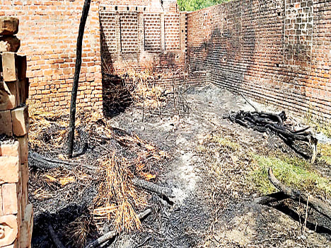Three houses burnt, thousands damaged