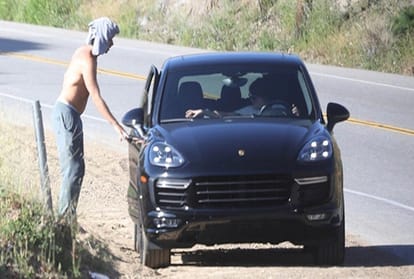 Dakota Johnson Picks Up Shirtless boyfriend Chris Martin after working up a sweat on a solo hike