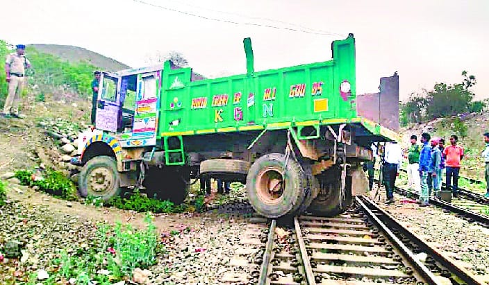 Dumpar trapped in railway track with child's mischief
