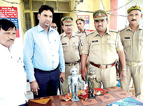 Two statues of precious metal recovered from the gutters