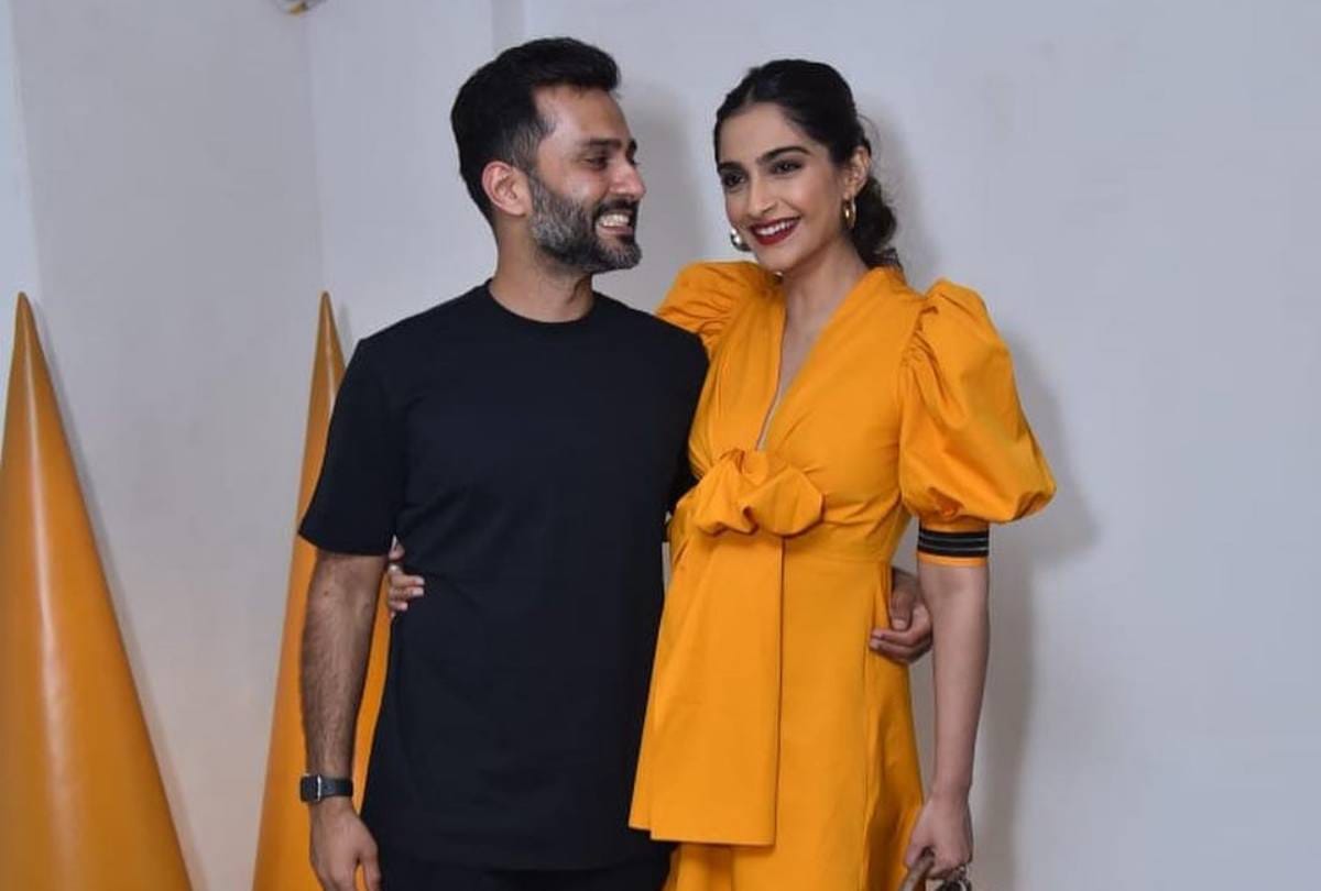 sonam kapooor husband anand ahuja tie her shoe lace at store launch event