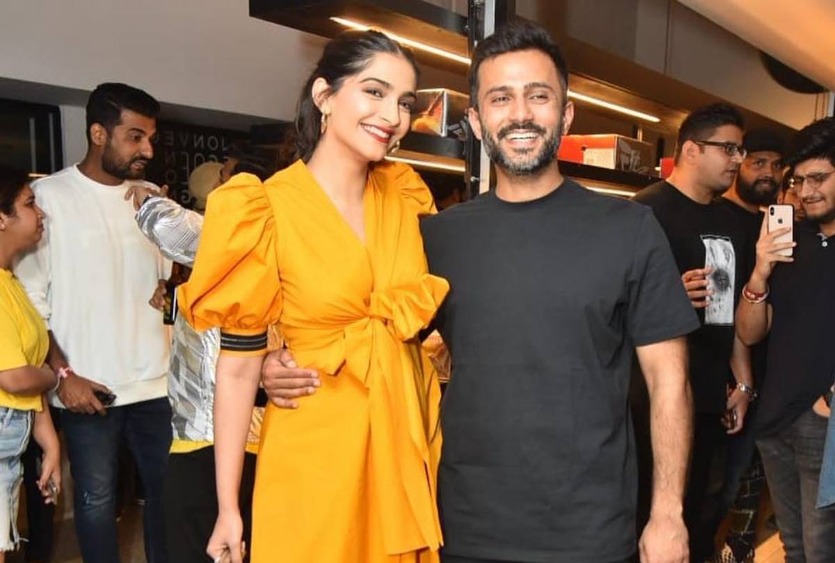 sonam kapooor husband anand ahuja tie her shoe lace at store launch event