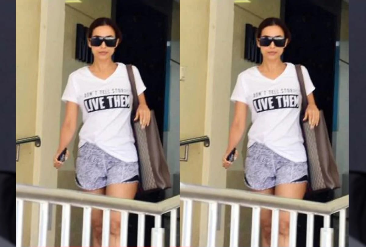 malaika arora pair t shirt shorts cool look with expensive gucci bag worth one lakh