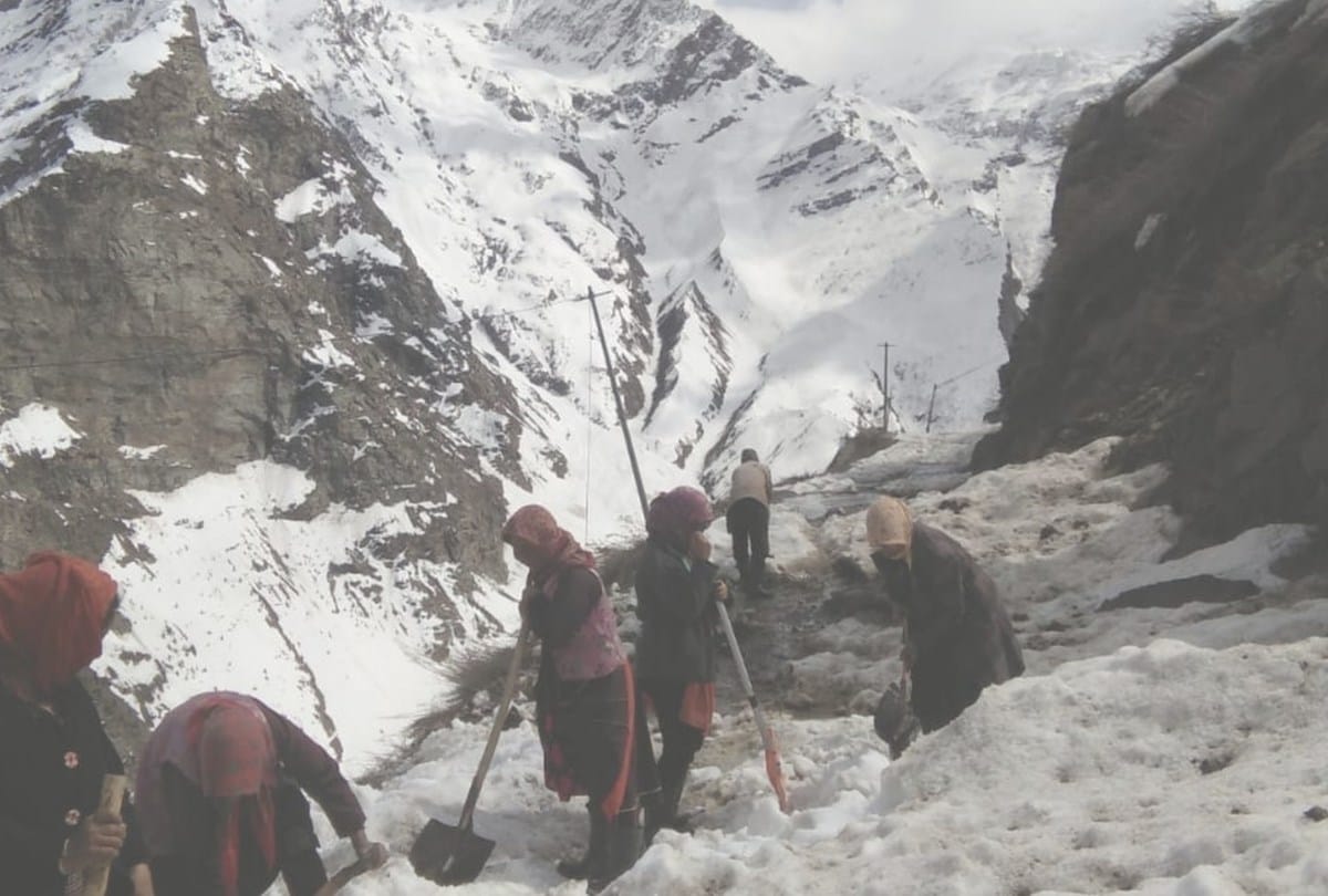 women clear snow on 2.5 kilometer road in lahaul spiti himachal Pradesh