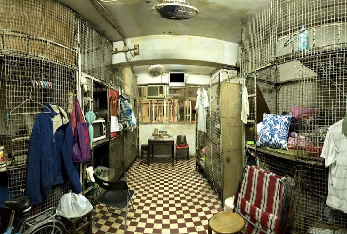 poor people in hongkong lives in metal Cage