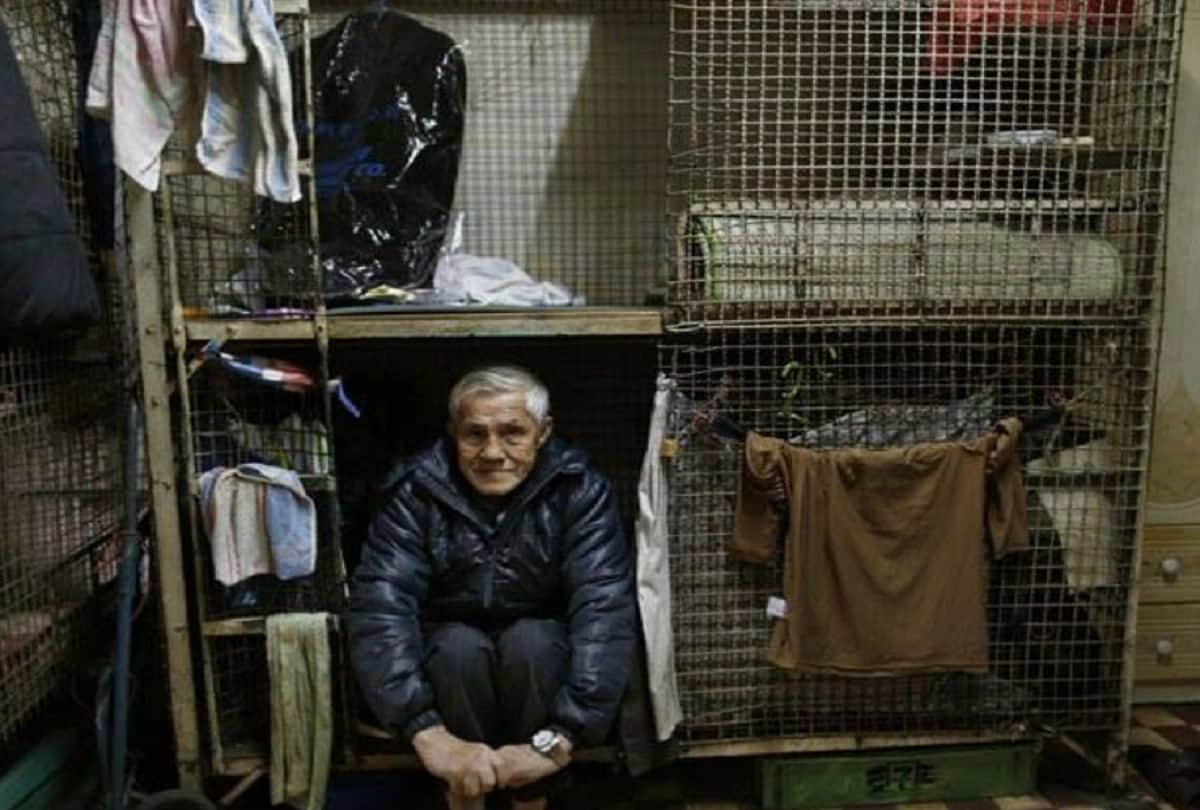 poor people in hongkong lives in metal Cage