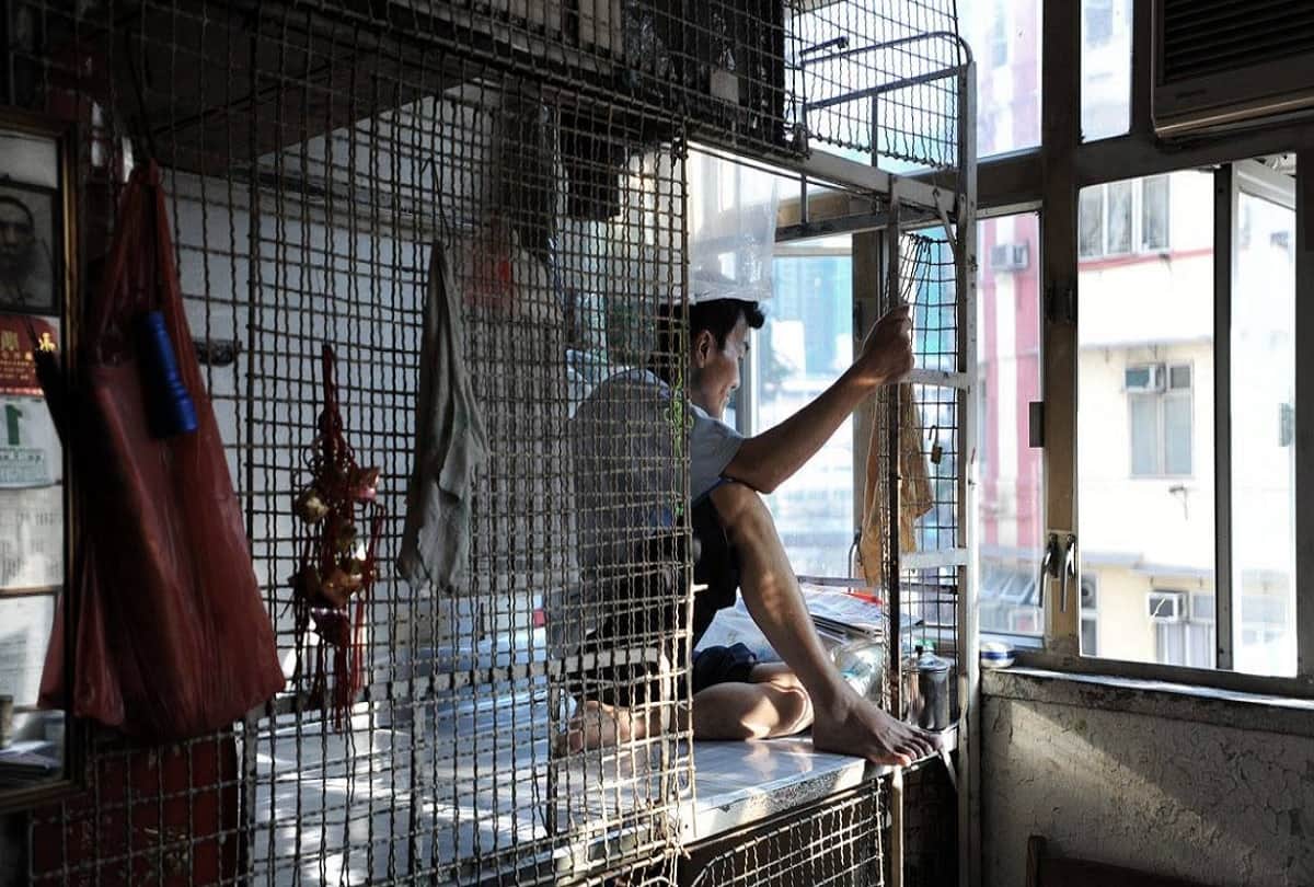 poor people in hongkong lives in metal Cage