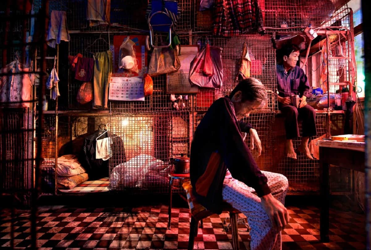 poor people in hongkong lives in metal Cage