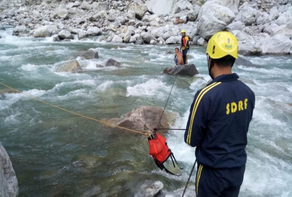 Sdrf Soldiers rescue Boy from Alaknanda river in gopeshwar photos