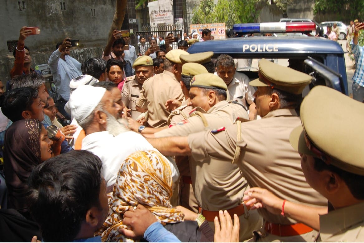 To rescue the young man from police custody