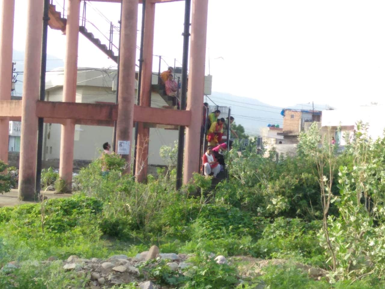 Expelled women worker of AIIMS rishikesh climb on water tank
