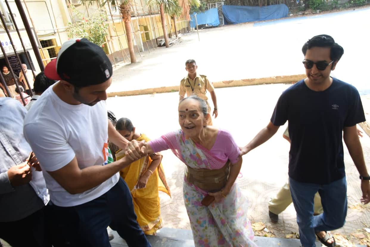 Varun Dhawan wins heart for helping an old lady climb the stairs during Lok Sabha Election 2019