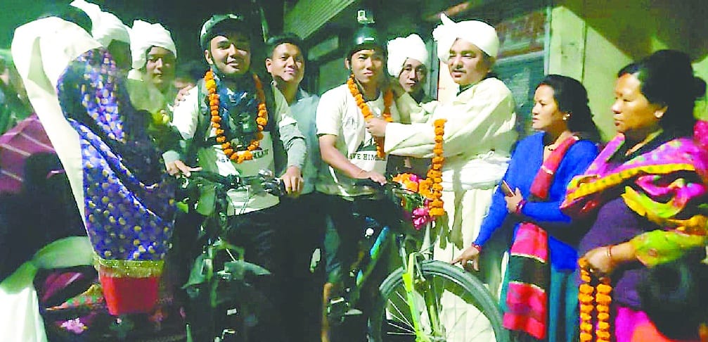 Two youth on bicycle travel to environmental protection