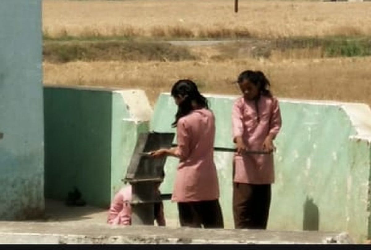 Children are forced to wash dishes in school of hapur