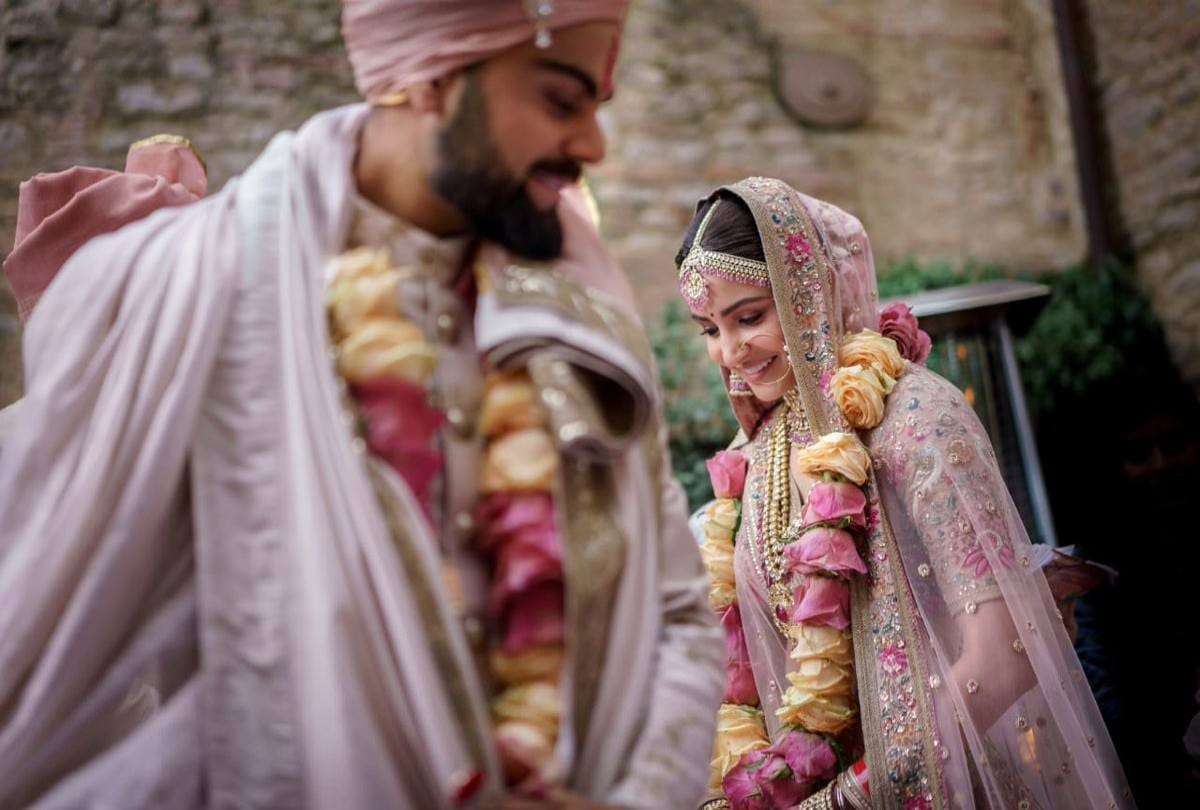 Virat Kohli Anushka Sharma wedding anniversary net worth love story wedding cost