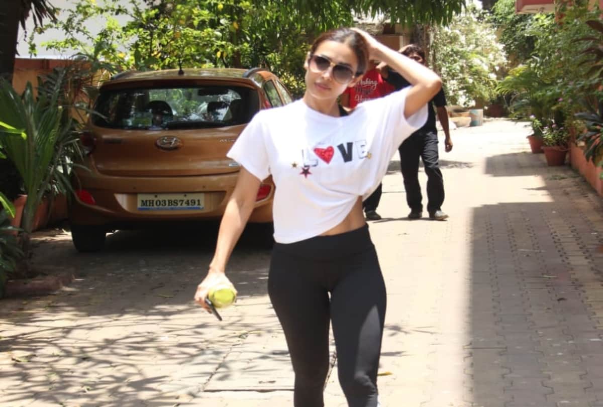 Malaika Arora spotted outside of gym wear white top quotes love