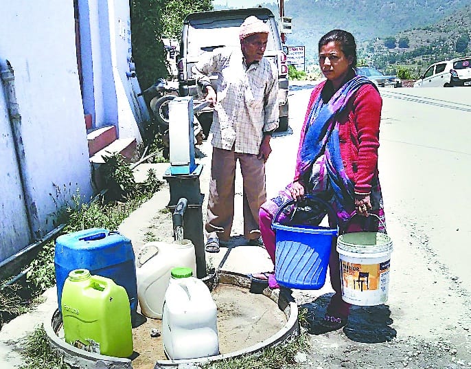 People are bringing water from handpump
