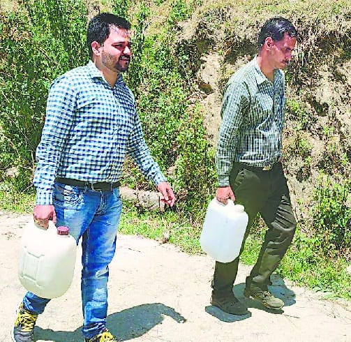 Doctor carrying water