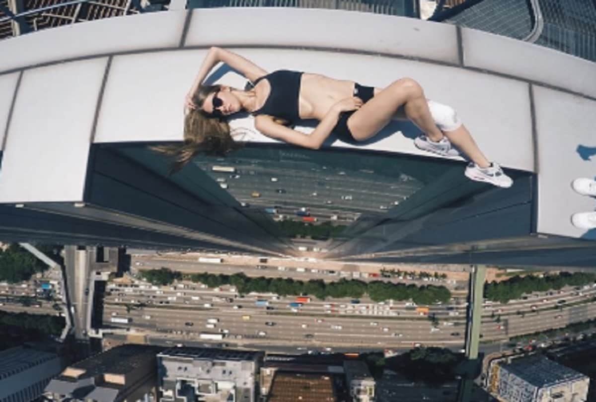 Russian Stunning daredevil girl Angela Nikolau Takes Riskiest Selfies On Asias tallest skyscrapers