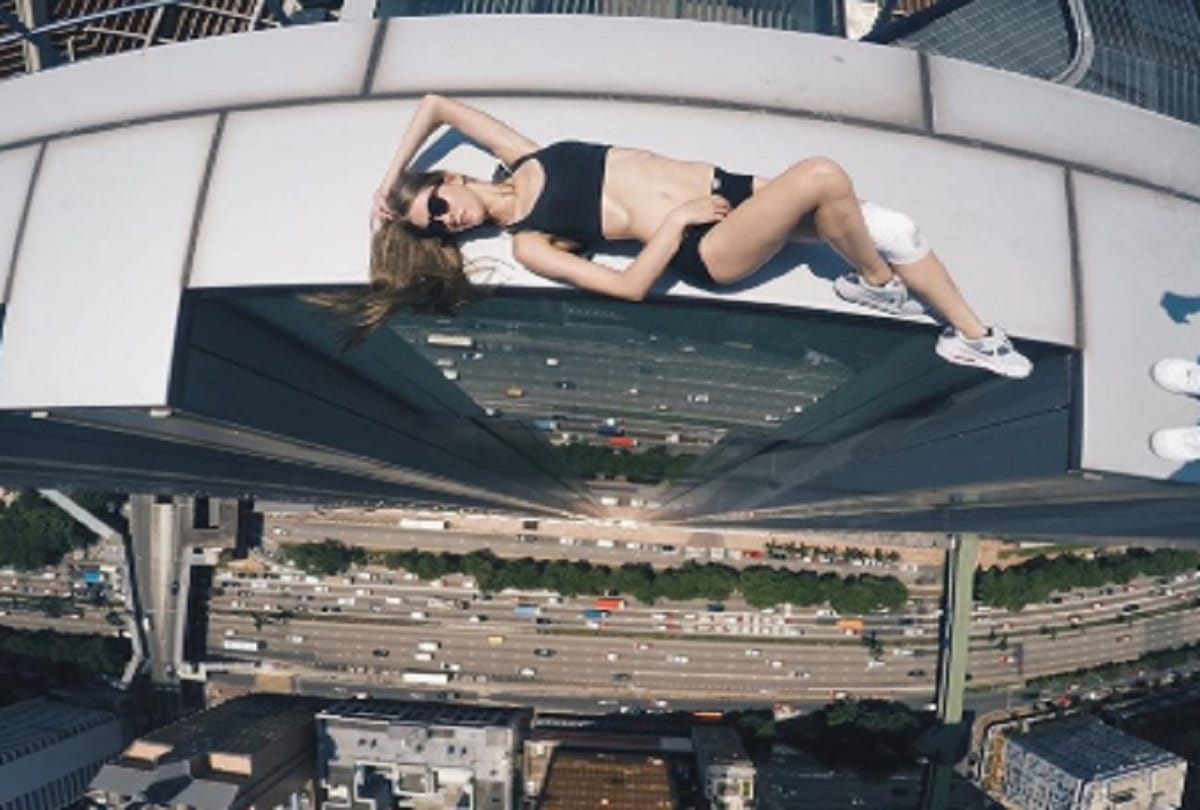 Russian Stunning daredevil girl Angela Nikolau Takes Riskiest Selfies On Asias tallest skyscrapers
