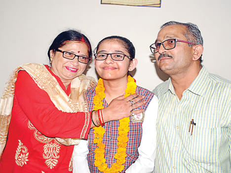 Riddhima, Saurabh and Akshat district toppers