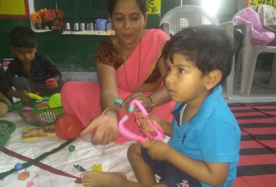 Sonbhadra DM son study in aanganbadi center