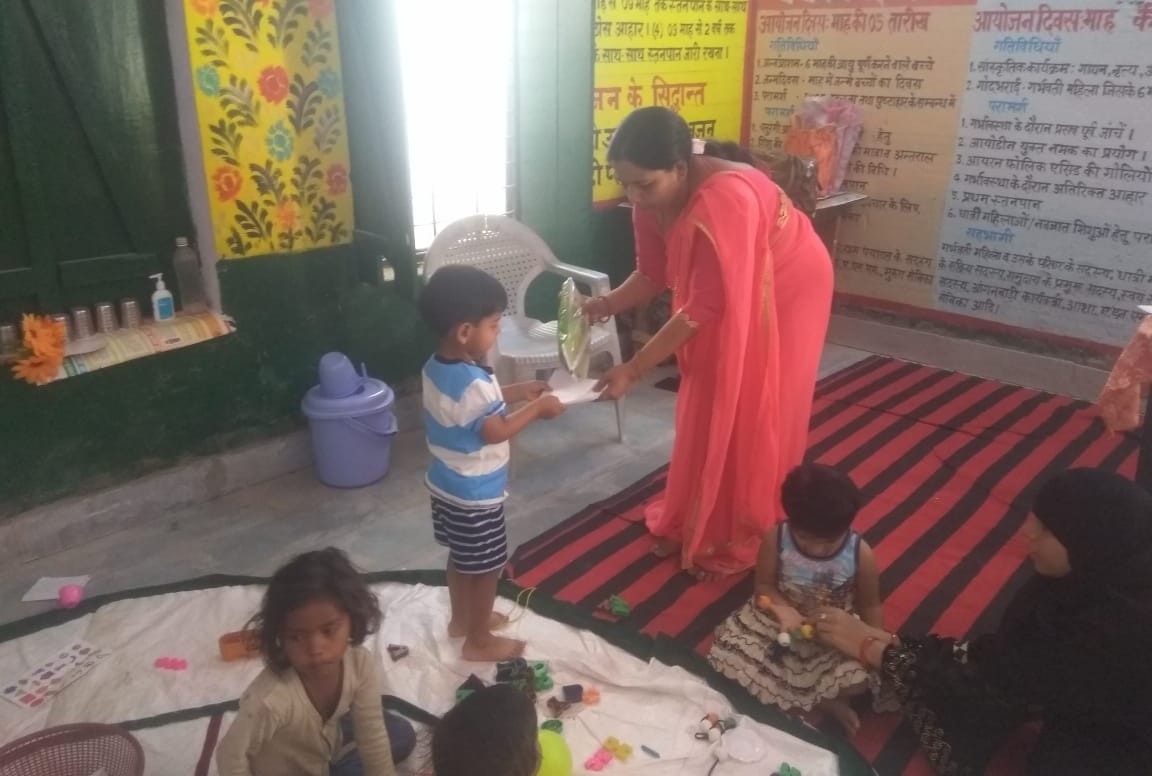 Sonbhadra DM 3 year old son study in aanganbadi center