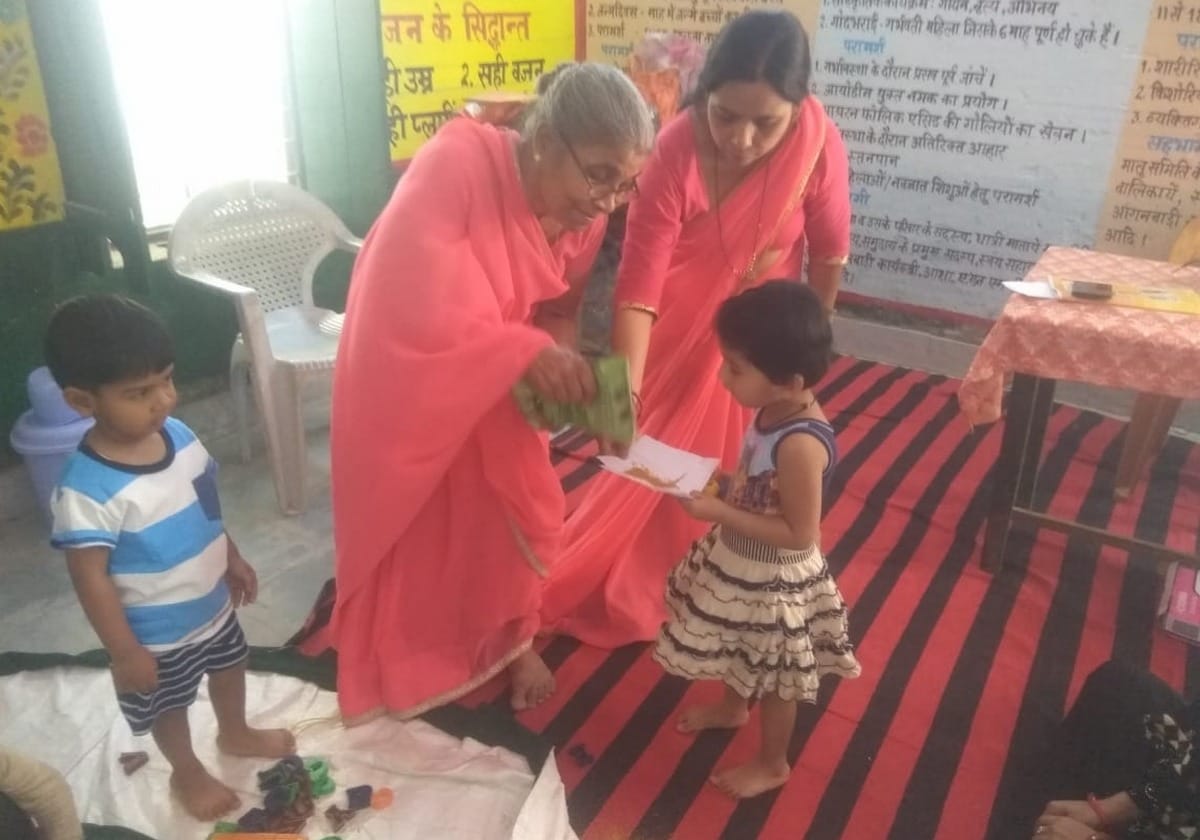 Sonbhadra DM 3 year old son study in aanganbadi center