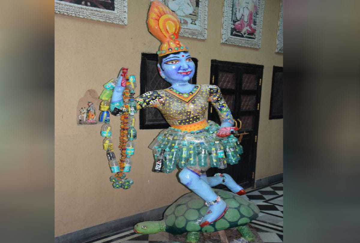 kolambiya devotee carries a statue of the Hindu goddess yamuna