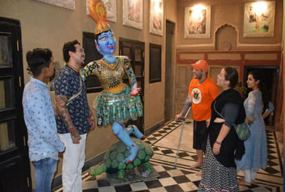 kolambiya devotee carries a statue of the Hindu goddess yamuna