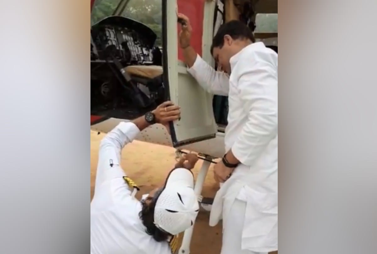 Rahul gandhi viral video helps pilot for repair door of helicopter una himachal pradesh
