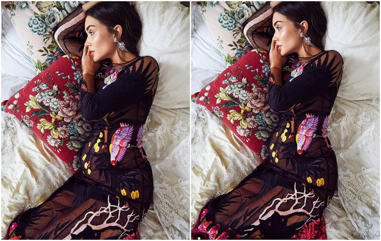 Amy Jackson Flaunts Her Baby Bump says Thinking about you lil one