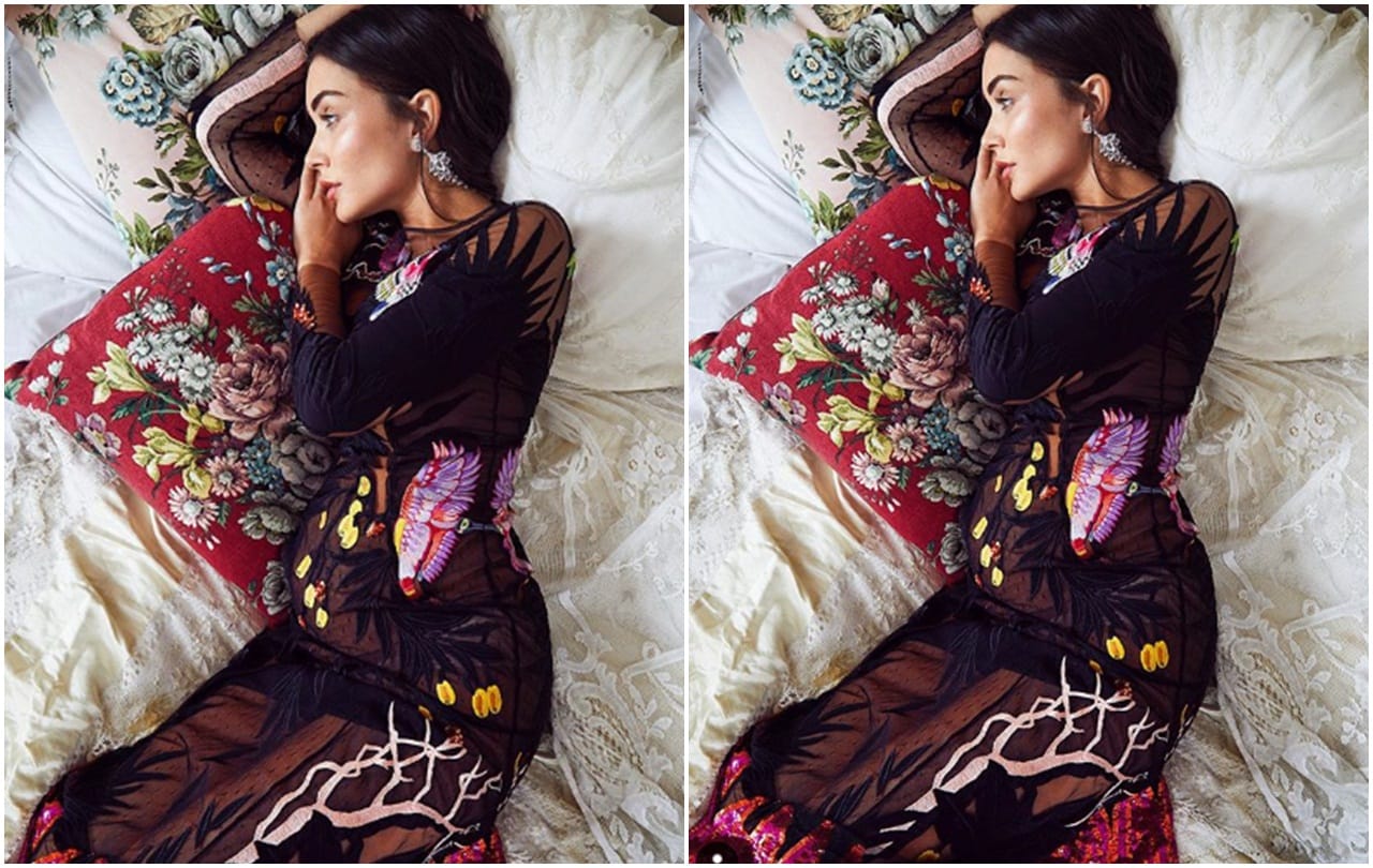 Amy Jackson flaunts her baby bump in sizzling green gown