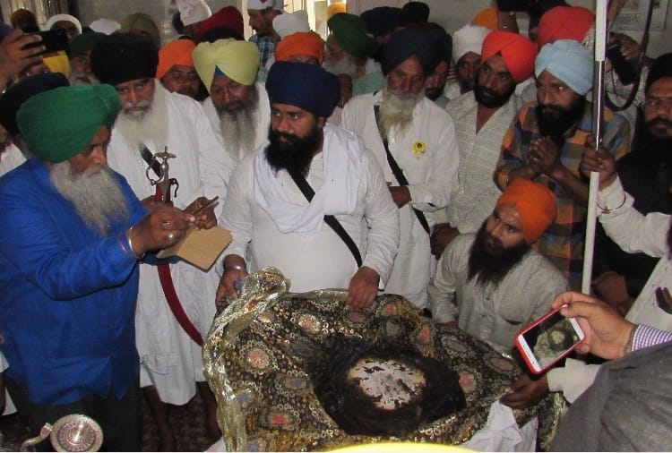 holy book shri guru granth sahib discourtesy in sangrur of punjab