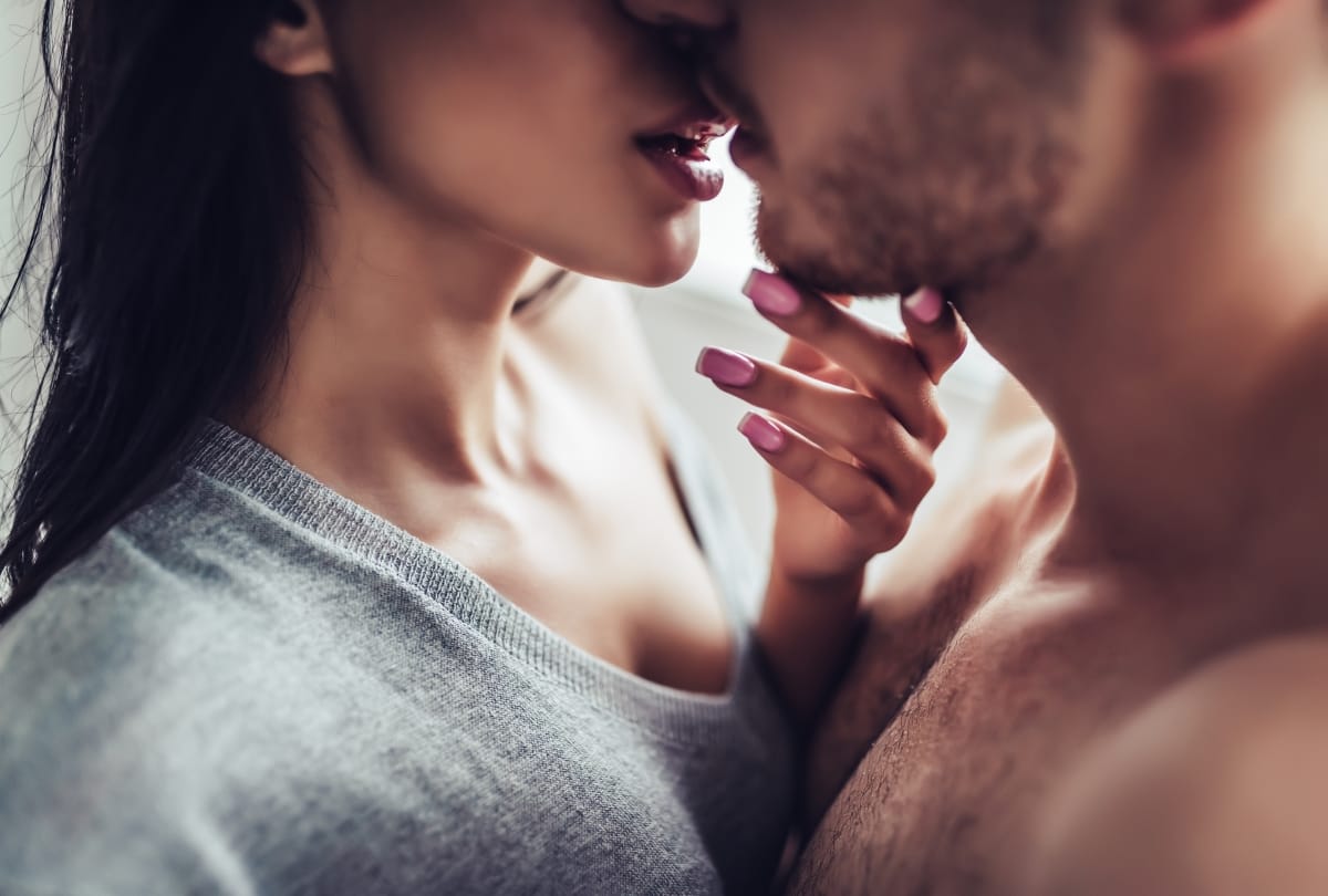 women bites of her boyfriend tounge in spain