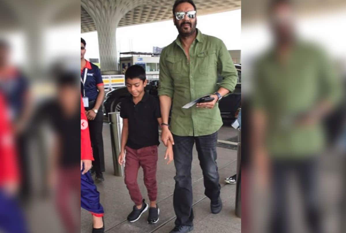 ajay devgn with son yug devgn at mumbai airport going to delhi