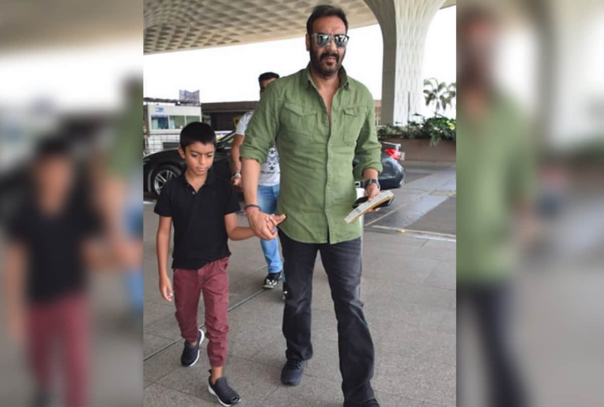 ajay devgn with son yug devgn at mumbai airport going to delhi