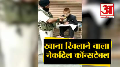CRPF Havaldar Iqbal Singh deployed in Srinagar feeds his lunch to a paralytic child