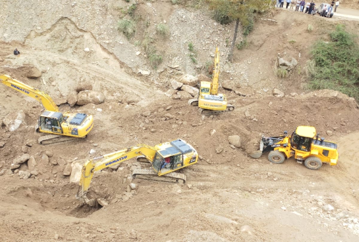 NDRF staff is finding man buried in landslide in Chamba