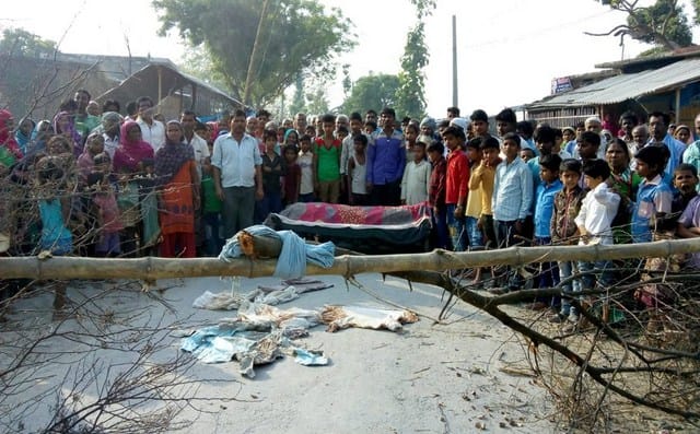 dead bodies set by the villagers